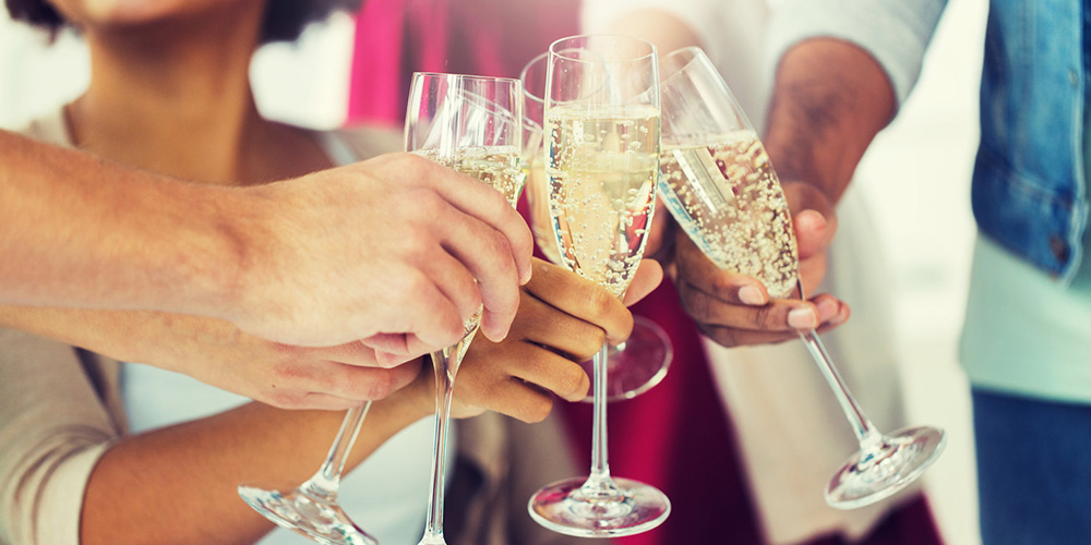 people toasting glasses of chanpagne