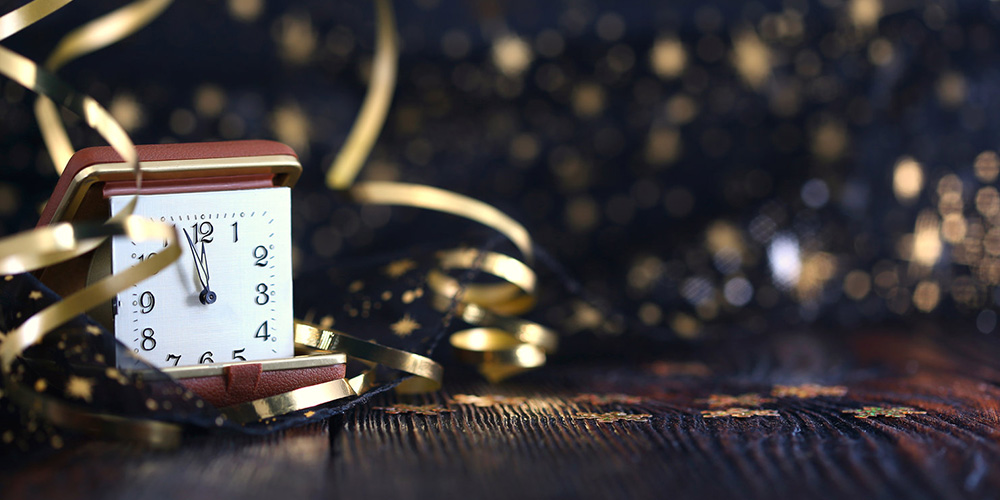 picture of a clock with gold and black decor