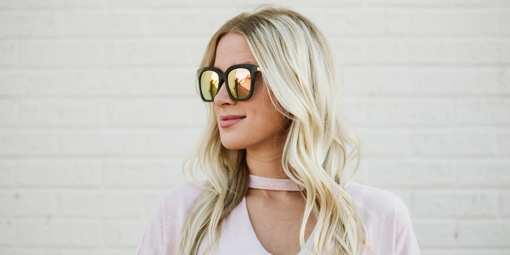 pretty woman wearing DIFF Eyewear sunglasses